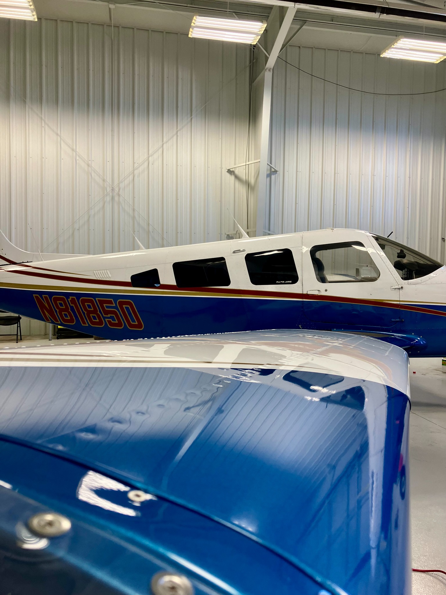 Shined wing reflecting hangar lights